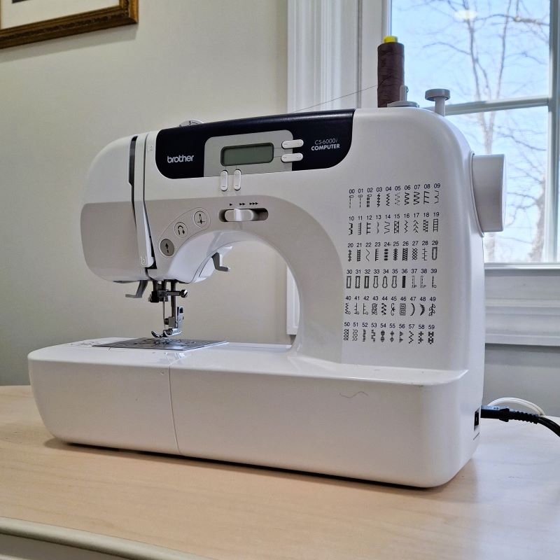 A Brother sewing machine on a table