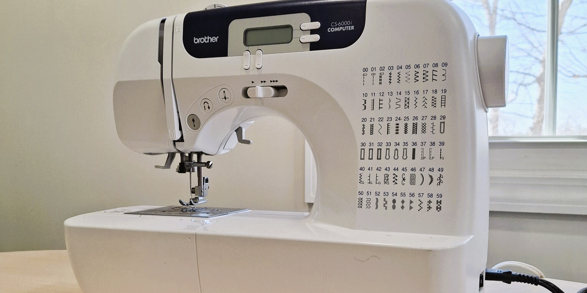 a Brother sewing machine on a table