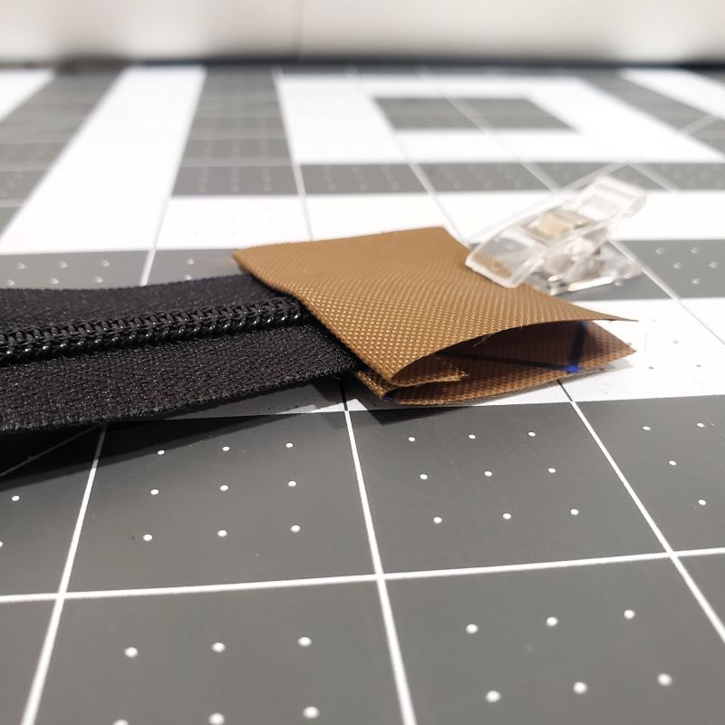 Zipper tab ready to be top-stitched