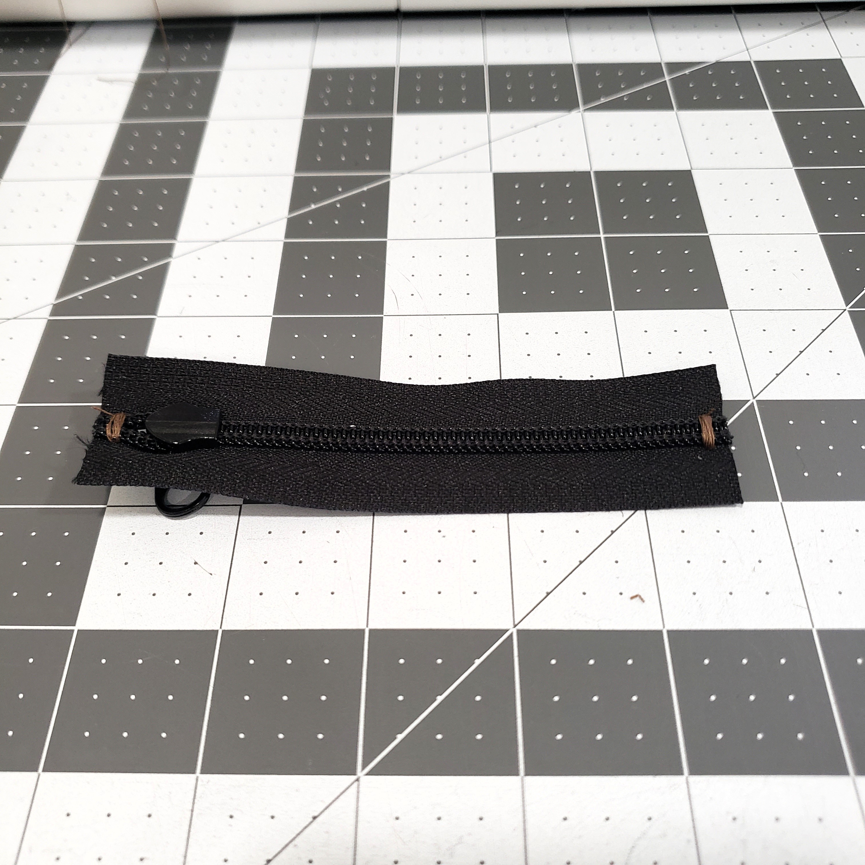 An assembled zipper.