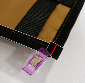 Double-fold bias tape folded over to create a clean corner.