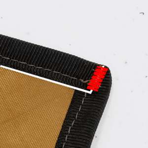 picture showing how to lock the corners of the grosgrain with a bar tack.