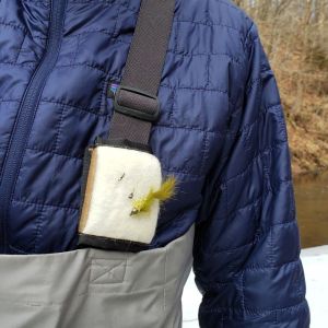 The Versa Fly Patch attached to wader suspenders