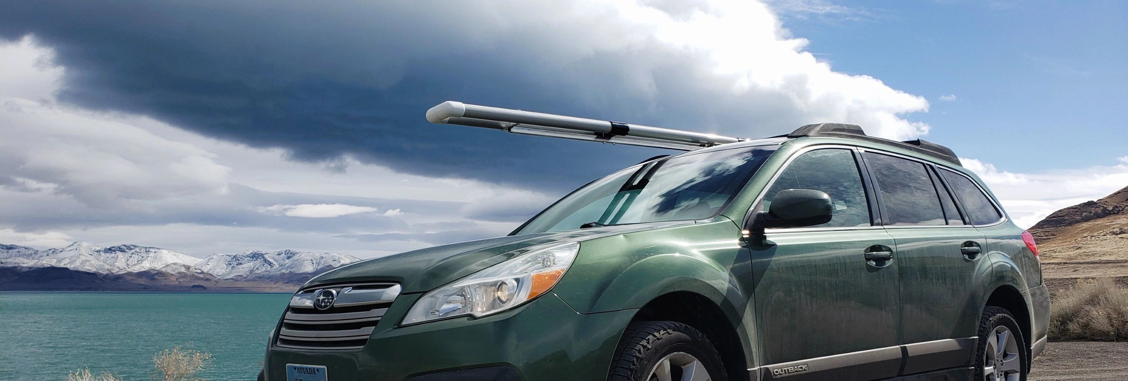 DIY Fly rod carrier shown in use atop a vehicle.